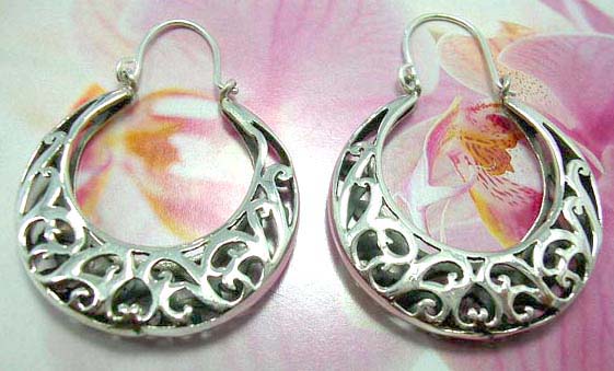 Circular sterling silver stud earring with Shiva's eye seashell stone inlaid