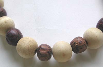 Bali fashion necklace catalog online - White and brown wooden Bali bead forming a necklace design    