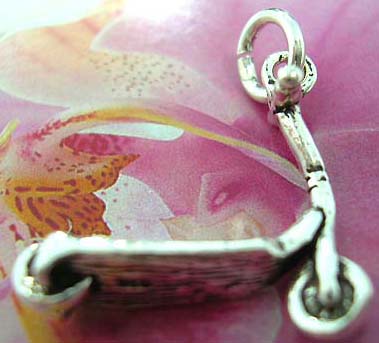 Thailand made solid sterling silver charm pendant in carved-out scooter     